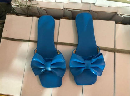 Spring/summer new 2022 outdoor flat leather bow non-slip beach lady slippers casual all-match fashion women sandals