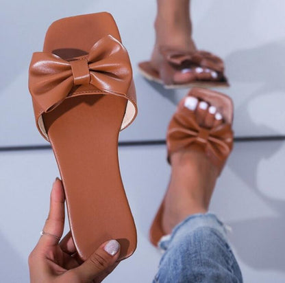 Spring/summer new 2022 outdoor flat leather bow non-slip beach lady slippers casual all-match fashion women sandals